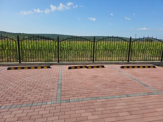 A tennis court with a fence