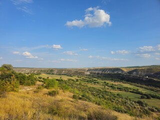 A landscape with hills and trees