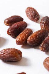 Fresh Organic Dates Close-Up on White Background