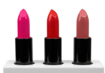 Obraz premium Three lipsticks in pink red and nude isolated on transparent background