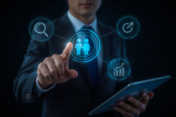 A businessman's finger touches a virtual screen displaying a digital network map, connecting the world