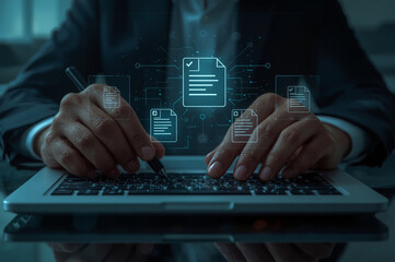 Business professional working on a laptop at a desk