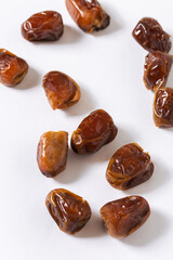 Close-Up of Chopped Fresh Dates on White Background