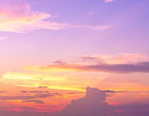 Fototapeta premium A stunning twilight sky painted in vibrant shades of purple, with wispy clouds softly illuminated by the fading sunlight, creating a serene atmosphere.