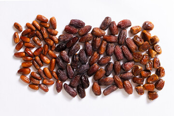 Assorted Varieties of Dates on White Background