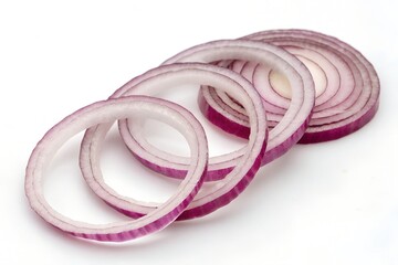Fresh red onion slices isolated on white background