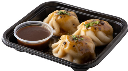A serving of Nepalese momos with steamed dumplings filled with vegetables and spices, served with a side of tomato chutney, placed on a ceramic plate with a view of Mount Everest