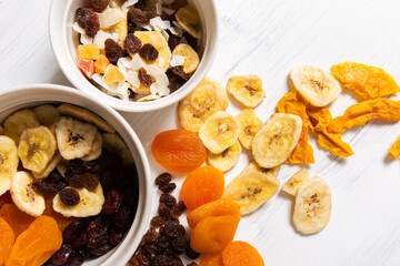 Assorted Dried Fruits in a Bowl and on Table