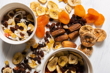 Assorted Dried Fruits in a Bowl and on Table