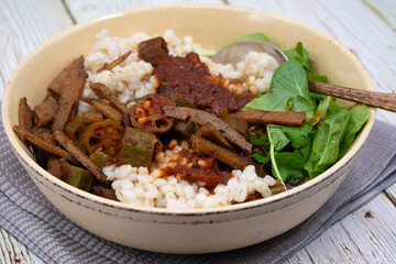 Seitan and okra curry over brown rice