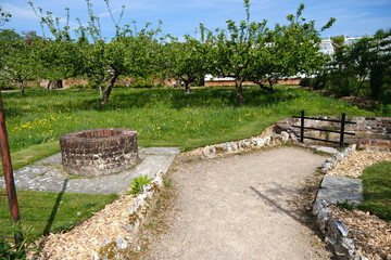 Wells in the orchard at West Dean Gardens.