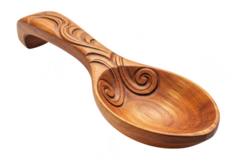 Beautifully hand carved wooden spoon with intricate swirl design isolated on transparent background