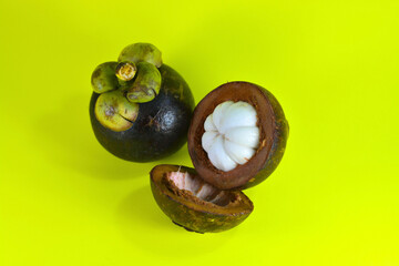 mangosteen fruit with yellow background