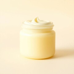 Creamy lotion in glass jar.