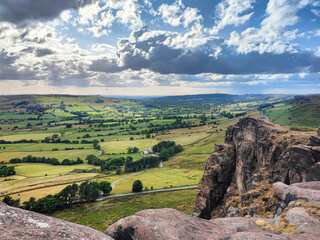 Picturesque mountain view from the Hen Cloud rocky ridge. Scenic view from the Roaches rocky hills and English countryside. Peak District near Leek, Staffordshire, England, UK
