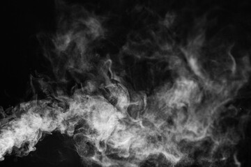 Blur white water vapour on isolated black background. Abstract of steam with copy space. Steam flow. Smoke on white background.