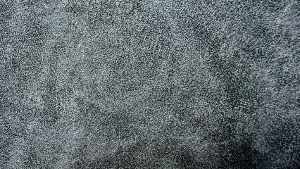 coarse grey microfiber fabric texture with subtle mottled pattern ideal for upholstery or interior design background
