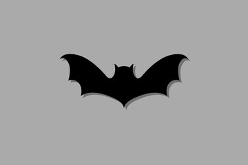 halloween bat vector illustration for logo, wallpaper, card, print, decor, etc. Black bat on grey background 