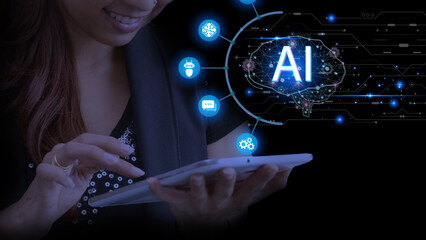 Beautiful young woman working with tablet with AI artificial intelligence interface. AI hologram with chatbot and online communication, Speech bubble. Deep learning.