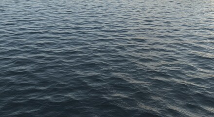 Obraz premium Dark blue water with small regular waves