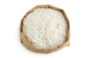 White flour in a paper bag isolated on white background. Top view. Flat lay.