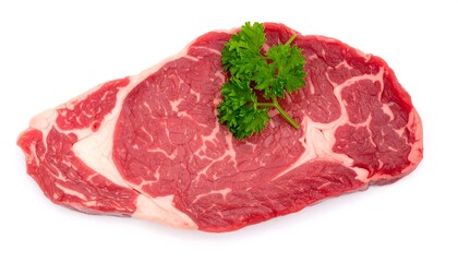 Obraz premium Raw steak with parsley