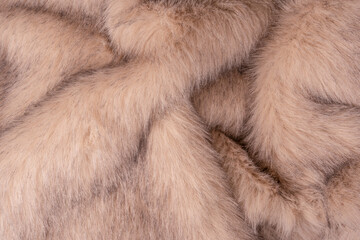 Texture of faux fur as a background, top view.