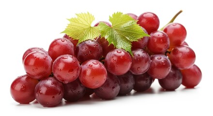 Fototapeta premium Fresh red grapes with green leaves isolated on white background