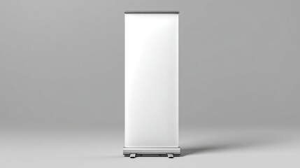 A minimalistic blank roll-up banner stand is displayed in an expansive indoor space, ready to be used for events, exhibitions, or promotional activities.
