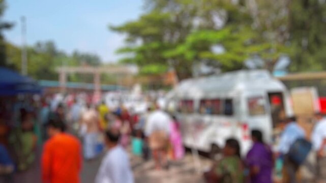 Bokeh view of devotees visit Balaji temple at Tirumala hill. The most visited place of Hindu pilgrimage. Sri Venkateswara Swamy Vaari Temple, Tirumala, Tirupati, India. Blurred background footage.