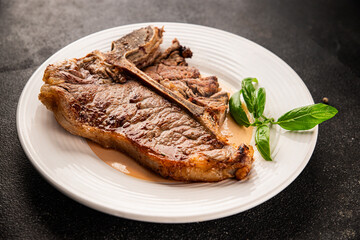 t-bone steak roast cut of meat juicy roast beef tasty snack fresh delicious gourmet food background on the table rustic food top view copy space