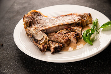 t-bone steak roast cut of meat juicy roast beef tasty snack fresh delicious gourmet food background on the table rustic food top view copy space