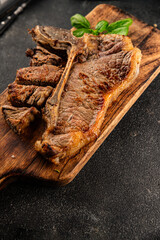 t-bone steak roast cut of meat juicy roast beef tasty snack fresh delicious gourmet food background on the table rustic food top view copy space