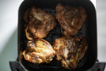 Deliciously cooked chicken thighs in air fryer.