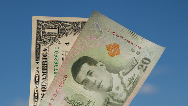 Dollar und Thail&auml;ndischen Bath Banknoten Bargeld Geldscheine, W&auml;hrungspaar USD THB, Amerikanischer Dollar und Thailand Bath Noten Geldscheine, Wechselkurs W&auml;hrungspaar, Zahlungsmittel bei Reisen