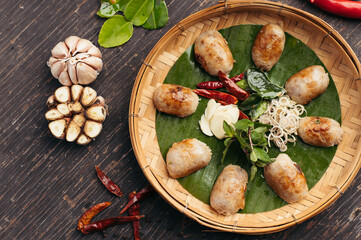 Grilled Food on Bamboo Plate with Garlic and Chili Peppers