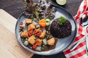 Savory Tofu Stir fry with Black Rice and Chili Peppers