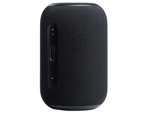 Obraz premium Dark gray, rounded, cylindrical speaker. Features a small, recessed control panel