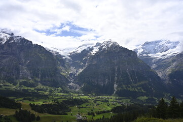Fototapeta premium Picturesque Swiss Mountain Scenery in the Jungfrau Alps in Bernese Oberland with Eiger and Mönch and glacier