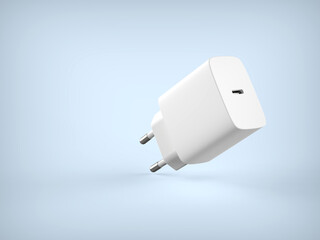 White mobile phone charger on a light blue background