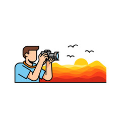 Fototapeta premium Photographer Capturing a Beautiful Sunset Over Rolling Hills with Birds in the Sky