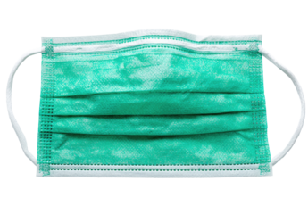 A light teal-green disposable face mask,  with white elastic ear loops,  and pleated material,  isolated on a black background