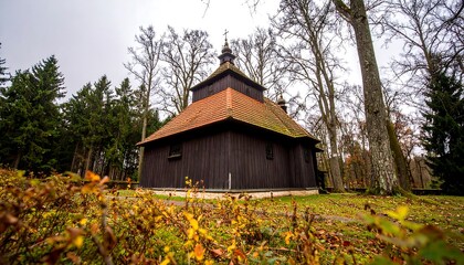 Wooden church in autumn forest