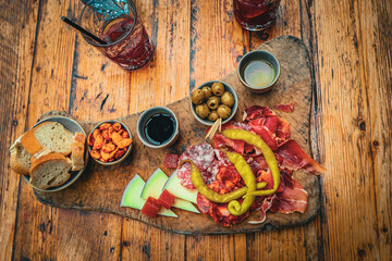 Spanish Charcuterie Board with Bread, Cheese, and Sangria