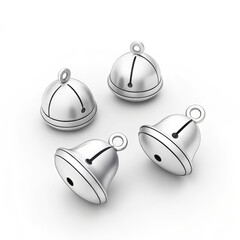 Fototapeta premium Four silver jingle bells with black accents arranged on a white surface in a studio setting