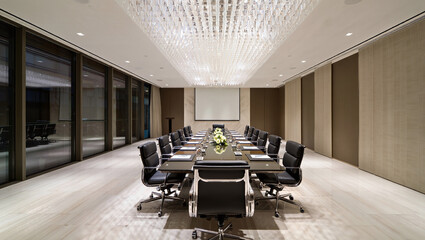 Luxury Conference Room With Grand Crystal Chandelier Glass Table And Black Leather Executive Chairs