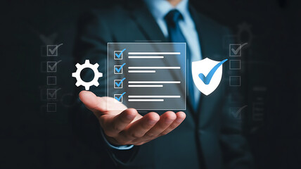 Businessman holding a digital interface with security icons and checklist for data protection and compliance