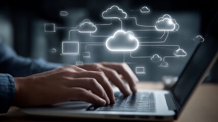 Person works on cloud computing using laptop
