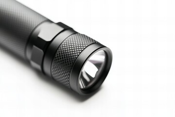 Black Tactical LED Flashlight Closeup on White Background