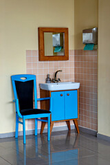 This is an image of a bathroom with a distinctive color scheme